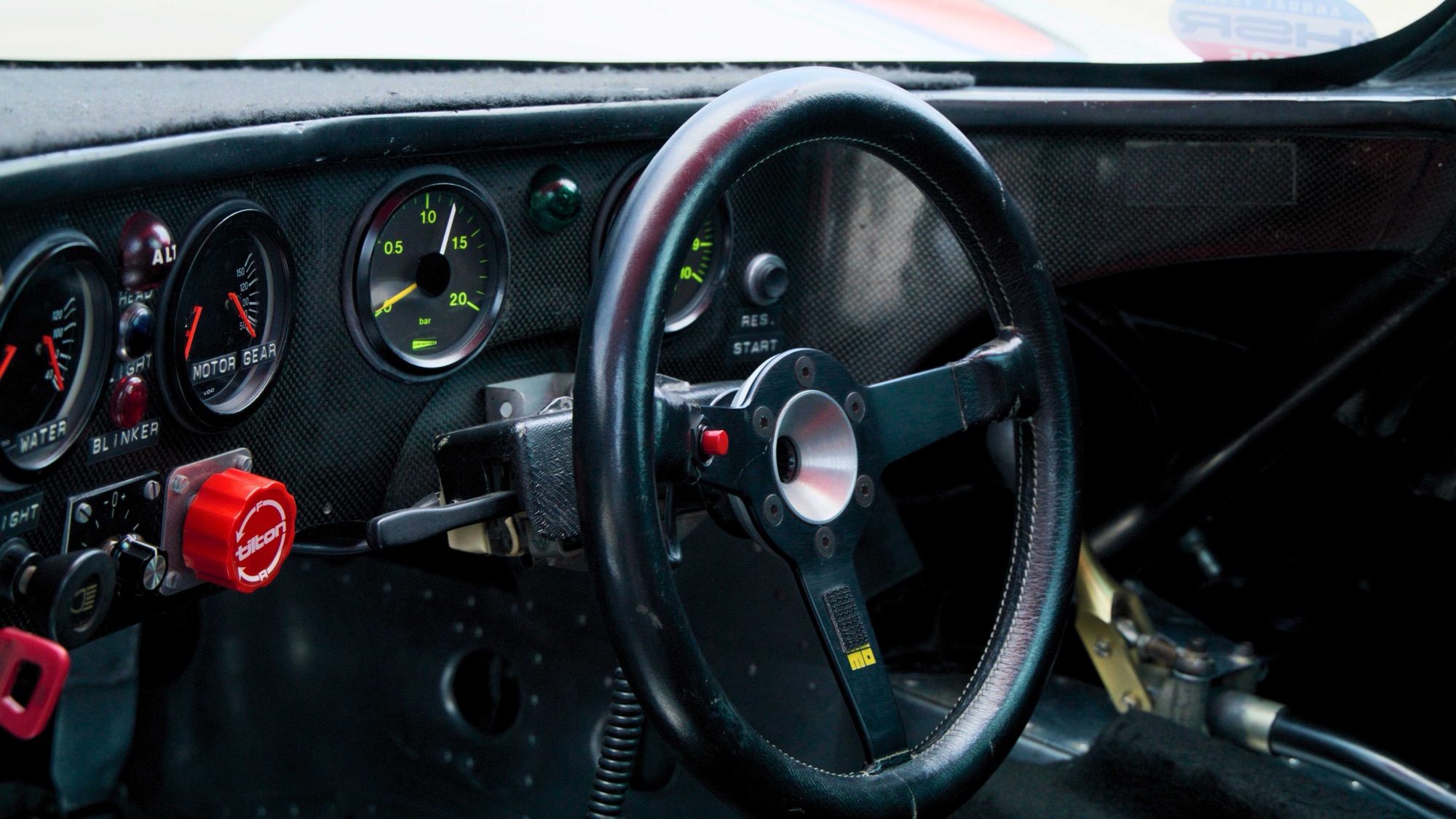Race car cockpit, consign your vehicle with Red Box Motors
