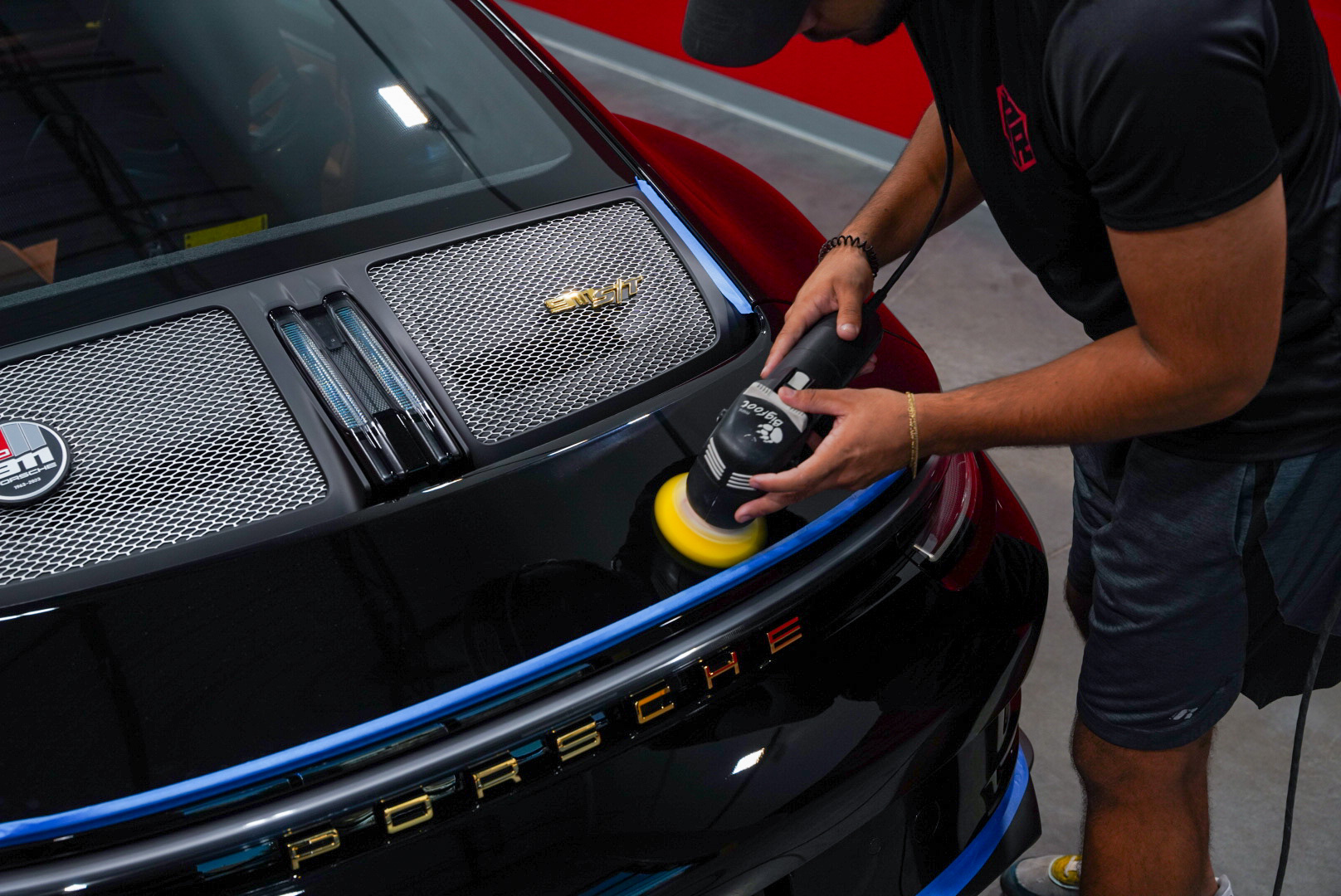 Machine paint correction on a Porsche 911 S/T at Red Box Restoration